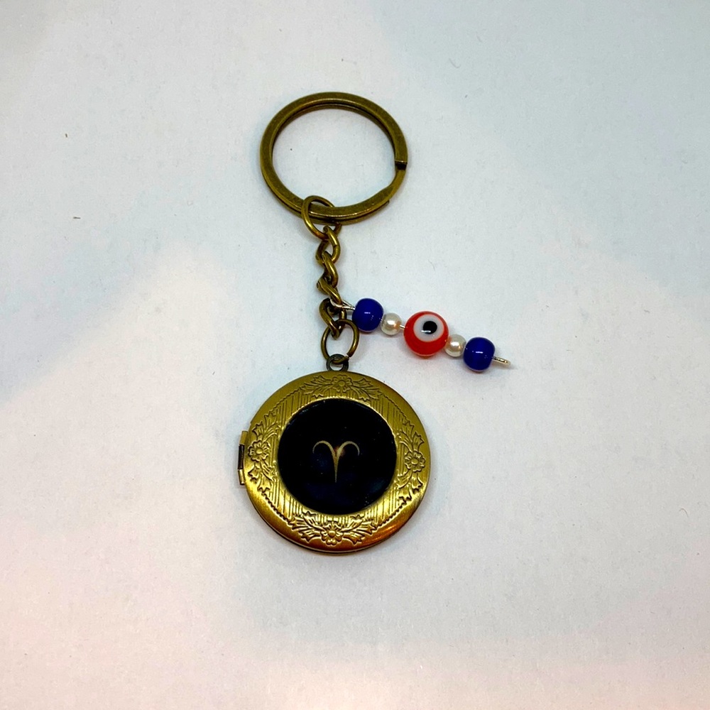 Zodiac Aries Locket Keychain: Embracing Courage with Greek Key & Evil Eye Charm